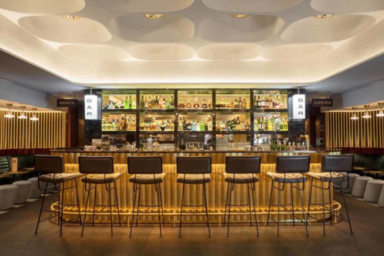 Buy Glass Top Bar Counter with Metal Facia with Recessed Lights and Brass Footrest for a Pub