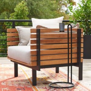 Teak Furntiture teakwood chair sitting in the outdoor sun